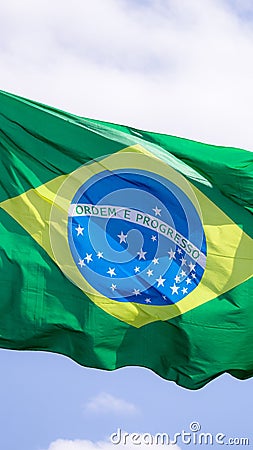 Brazil national flag textile cloth waving on top, blue sky brazil, patriotism concept Stock Photo