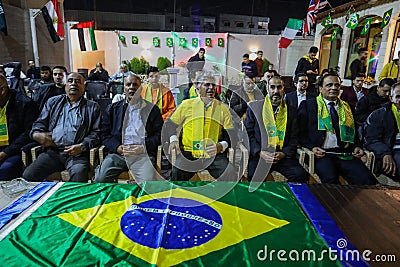 The Brazilian ambassador to Palestine, Francisco Mauro Uland Brasil, watches the Brazil national team match against Switzerland Editorial Stock Photo