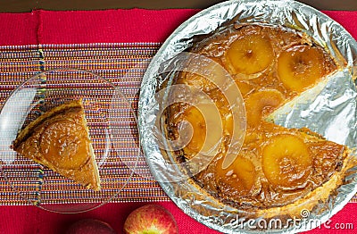 Brazilian apple pie, sweet very famous in Brazil on the wood table kitchen. Top View Stock Photo