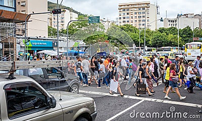 Brazilian cross the street of business centre in Santa Teresa Editorial Stock Photo