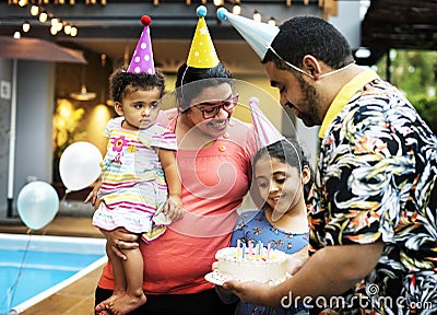 Brazilian family enjoying daughter birthday party Stock Photo