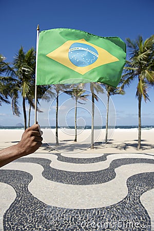 Brazilian Hand Waving Flag Copacabana Rio Brazil Stock Photo