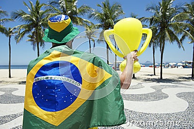 Brazilian Holding Trophy Copacabana Beach Stock Photo