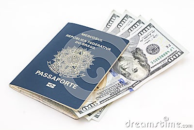 Brazilian passport and dollars Stock Photo