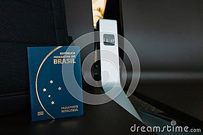 Brazilian passport near a backpack Stock Photo