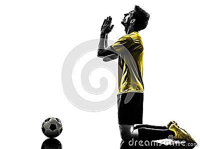 Brazilian soccer football player praying man Stock Photo