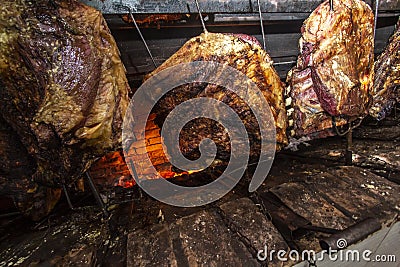 Brazilian style beef ribs Barbecue grill on skewers at a churrascaria steakhouse Stock Photo