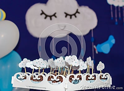 Brazilian sweet brigadeiro. Background for birthday party, with airplanes, balloons and clouds smiling in a beautiful blue sky Stock Photo