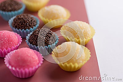 Brigadeiro, Beijinho and Bicho de Pe: sweets from Brazil. Child Stock Photo