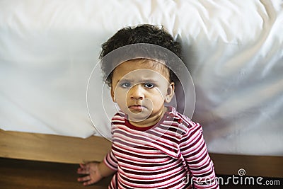 Brazilian toddler girl express curious face Stock Photo