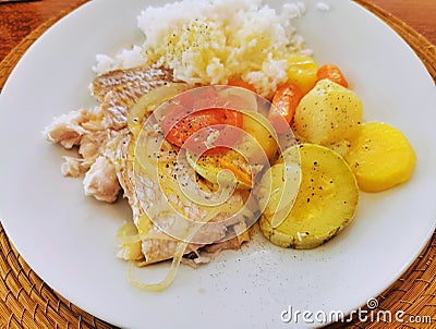 Brazilian Typical dish made of fish, rice and vegetables Editorial Stock Photo