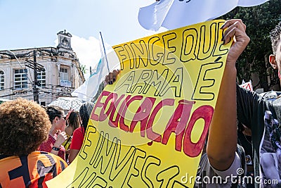 Brazilians protest against money cuts in education by President Jair Bolsonaro in the city of Salvador, Bahia Editorial Stock Photo