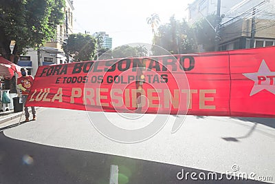 Brazilians protest with banners and posters with words against the government of President Jair Bolsonaro Editorial Stock Photo