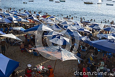 Brazilians and tourists bathe at Porto da Barra beach Editorial Stock Photo