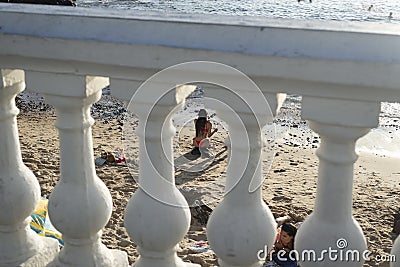 Brazilians and tourists bathe at Porto da Barra beach Editorial Stock Photo