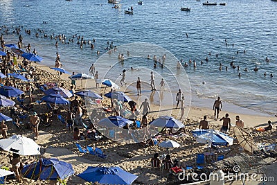 Brazilians and tourists bathe at Porto da Barra beach Editorial Stock Photo