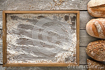 Bread bakery background. Brown and white wheat grain loaves comp Stock Photo