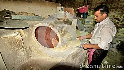 Bread baking in typical bakary in Middle East. Kurdistan, Iraq Editorial Stock Photo