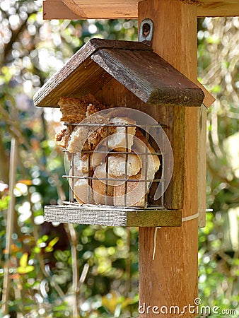 Bread in birdhouse Stock Photo