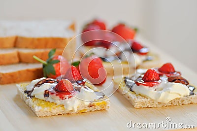 Bread and canape with strawberry topping Stock Photo