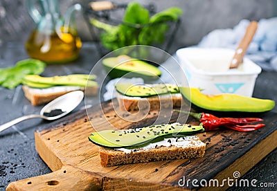 Bread with cheese and with avocado Stock Photo