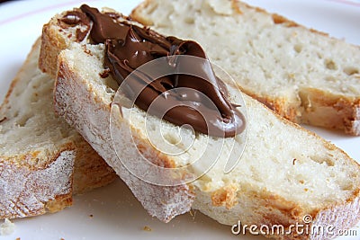 Bread with chocolate spread Stock Photo