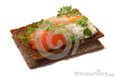 Bread crisp with salmon, soft cheese and chervil Stock Photo