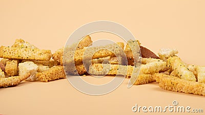 bread croutons closeup, beer snacks on beige background Stock Photo