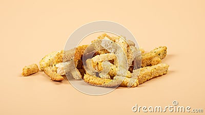 bread croutons closeup, beer snacks on beige background Stock Photo