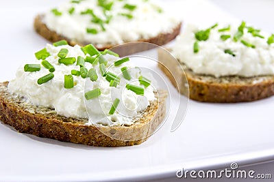 Bread with curd cheese and chives Stock Photo