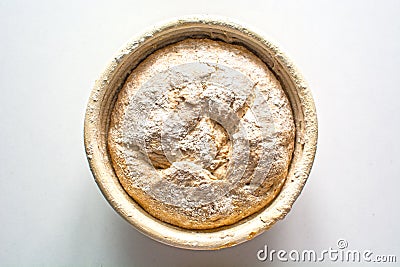 Bread dough raw in proofing basket Stock Photo