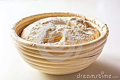 Bread dough raw in proofing basket Stock Photo