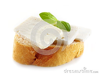 Bread with fresh goat cheese Stock Photo