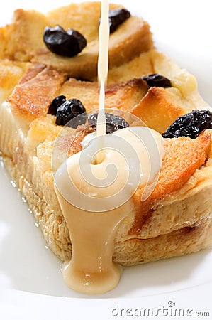 Bread Pudding Covered with Fla Drop Stock Photo