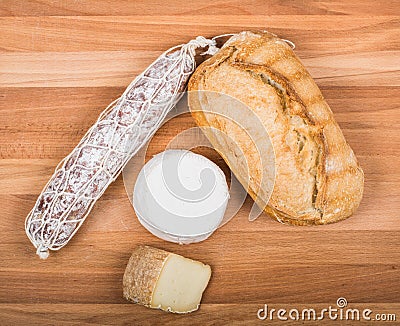 Bread, salami and cheeses Stock Photo