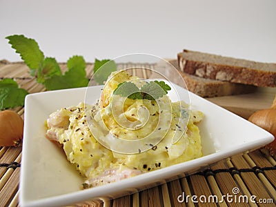 Bread spread with corn and lemon balm Stock Photo