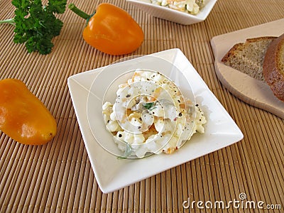 Bread spread with cottage cheese, olives and sweet peppers Stock Photo
