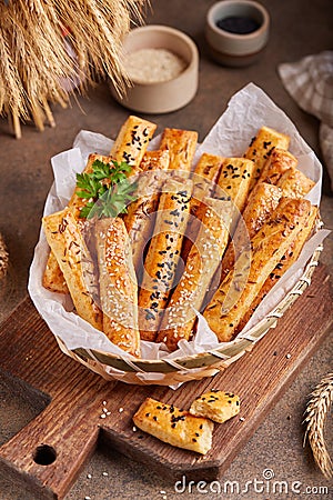 Bread sticks grissini with sesame seeds and cumin. Savory snack Stock Photo