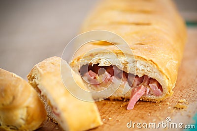 Bread stuffed with cheese and bacon Stock Photo