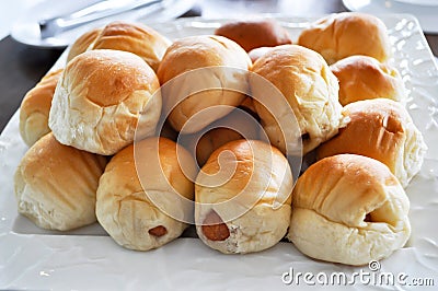 Bread stuffed with sausage Stock Photo