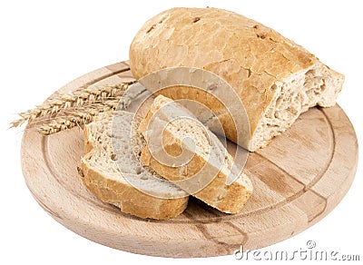 Bread on wooden board, isolated Stock Photo