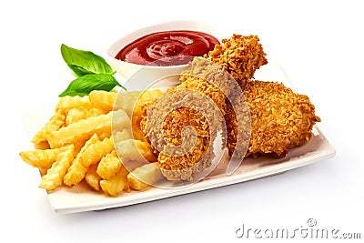 Breaded crispy fried chicken legs with french fries and tomato sauce, isolated on white background Stock Photo