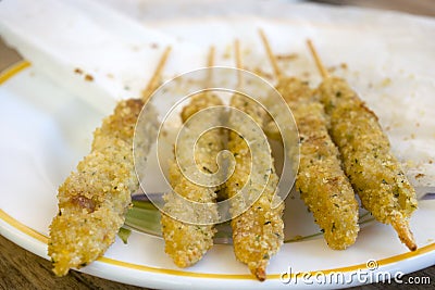 Breaded fish skewers Stock Photo