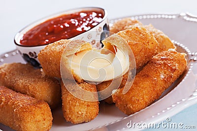 Breaded mozzarella cheese sticks Stock Photo