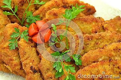 Breaded pork chops on a plate Stock Photo