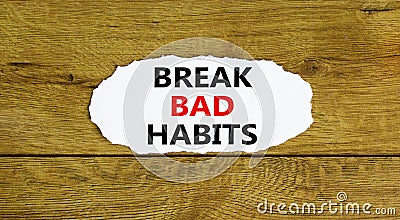 Break bad habits symbol. Words `Break bad habits` on white paper. Beautiful wooden background. Business, psychology and break ba Stock Photo