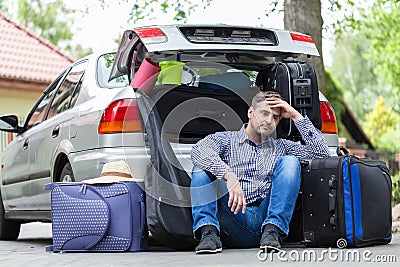 Break in packing stuff for trip Stock Photo