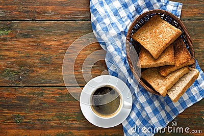 Breakfast background, toast and coffee on rustic wood, top view Stock Photo