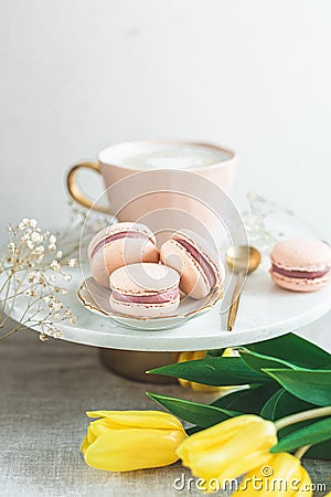 Breakfast in bed, cup of cappuccino, flowers Stock Photo