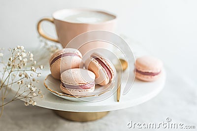 Breakfast in bed, cup of cappuccino, flowers Stock Photo